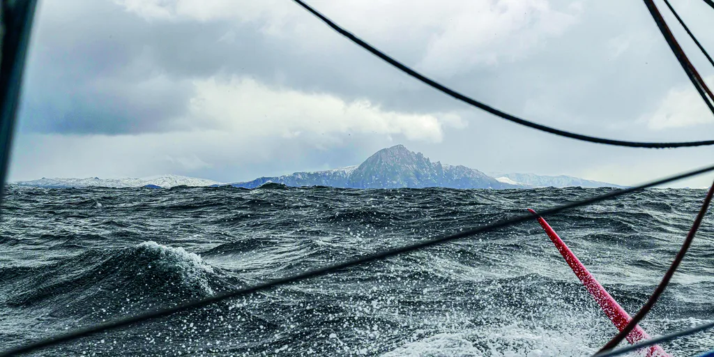 CAP HORN, CHILI - 28 MARS 2023 : Paul Meilhat (FRA), skipper de Biotherm, est photographié en train de doubler le Cap Horn lors de l'étape 3 de l'Ocean Race le 28 mars 2023 - Photo by Ronan Gladu / Biotherm sailing