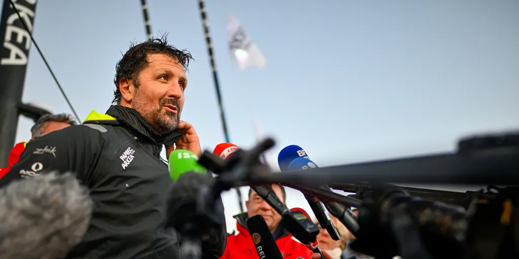 LES SABLES D'OLONNE, FRANCE - JANUARY 15, 2025 : PAPREC ARKÉA skipper Yoann Richomme (FRA) is photographed being interviewed by media after taking 2nd place in the Vendee Globe, on January 15, 2025 in Les Sables d'Olonne, France - (Photo by Jean-Louis Carli / Alea)