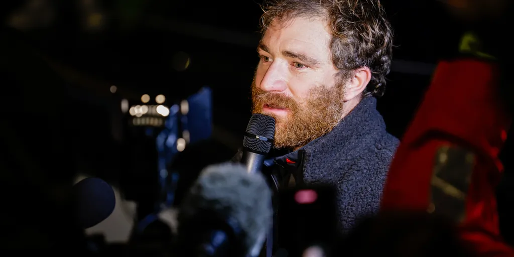 LES SABLES D'OLONNE, FRANCE - JANUARY 27, 2025 : GUYOT Environnement - Water Family skipper Benjamin Dutreux (FRA)) is being interviewed by media after taking 10th place in the Vendee Globe, on January 27, 2025 in La Rochelle, France - (Photo by Anne Beauge / Alea)