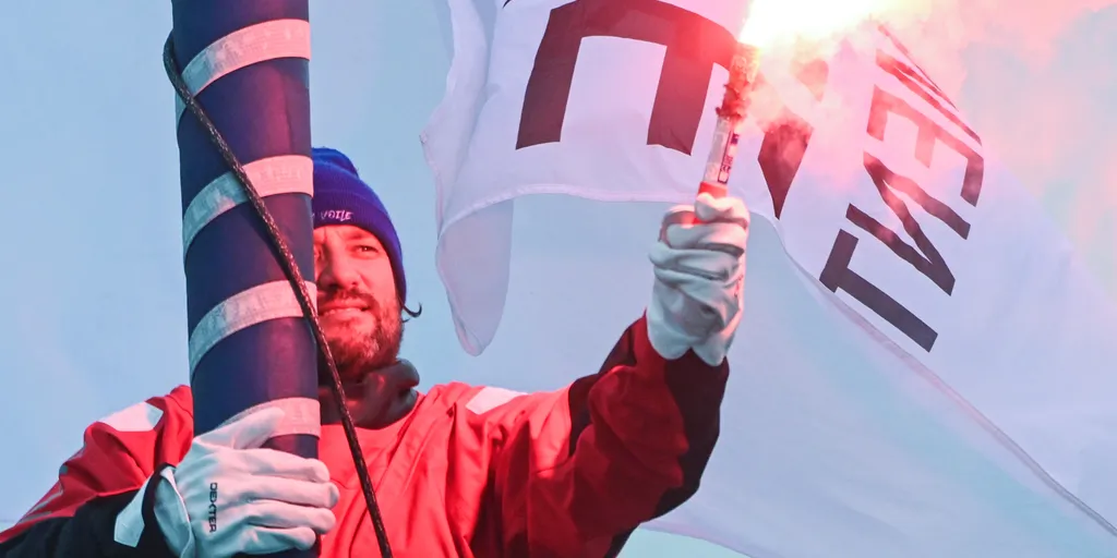 LES SABLES D’OLONNE, FRANCE - FEBRUARY 14, 2025 : HUMAN Immobilier skipper Antoine Cornic (FRA) is celebrating with flares after taking 28th place in the Vendee Globe, on February 14, 2025 in Les Sables d'Olonne, France - (Photo by Vincent Curutchet / Alea)
