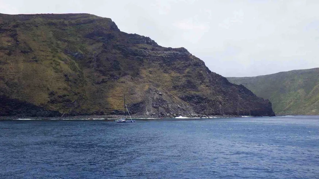 RACE, DECEMBER 16, 2024 : Photo sent of the boat HUMAN Immobilier moored off St-Paul island during the Vendee Globe sailing race on December 16, 2024. (Photo by Martin Pourtau - Contrôleur des pêches des TAAF à bord du bateau de pêche l' Austral)