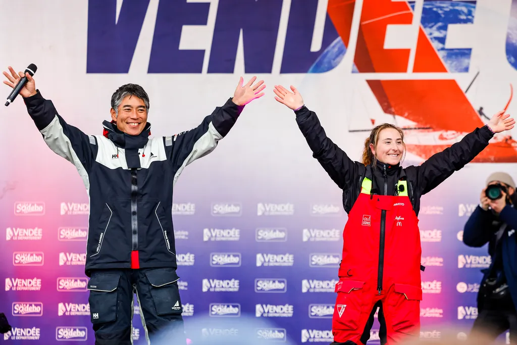 LES SABLES D’OLONNE, FRANCE - FEBRUARY 09, 2025 : DMG MORI Global One skipper Kojiro Shiraishi (JAP) and DeVenir skipper Violette Dorange (FRA) are photographed onstage after taking 24th & 25th place in the Vendee Globe, on February 09, 2025 in Les Sables d'Olonne, France - (Photo by Anne Beauge / Alea)