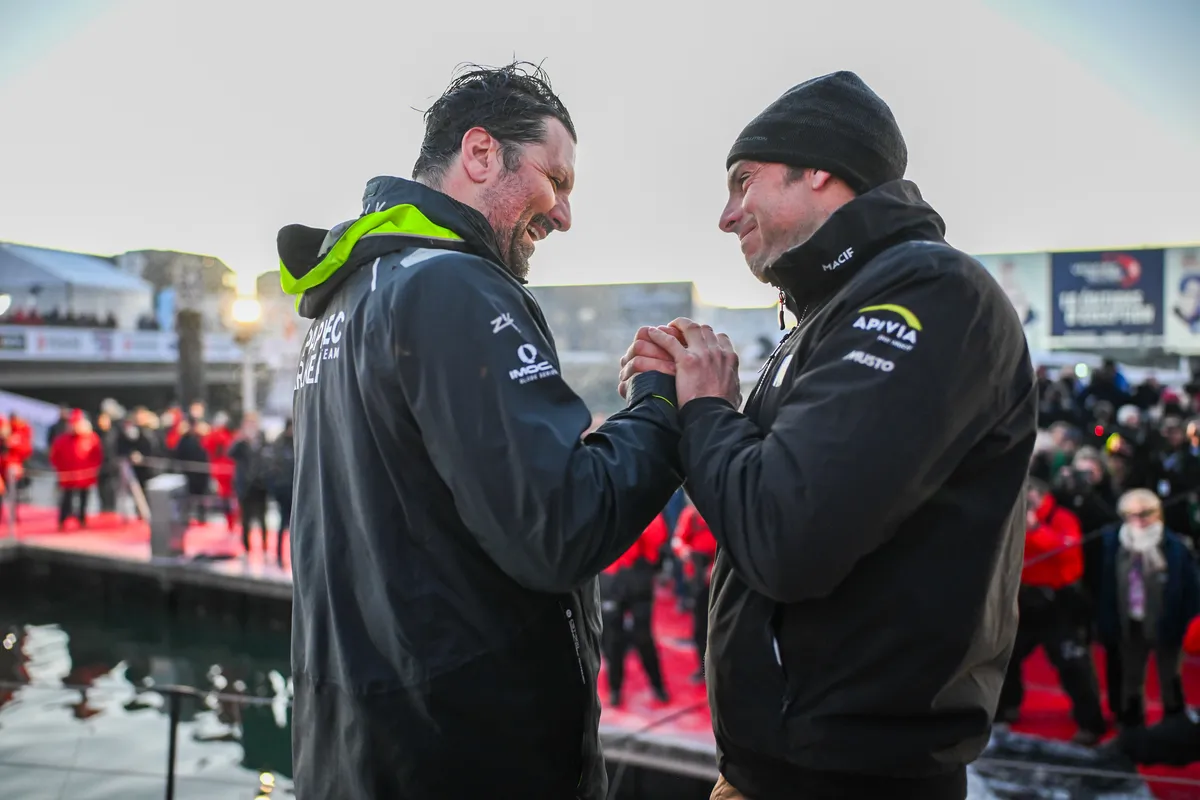 LES SABLES D'OLONNE, FRANCE - JANUARY 15, 2025 : PAPREC ARKÉA skipper Yoann Richomme (FRA) is photographed with winner Charlie Dalin after taking 2nd place in the Vendee Globe, on January 15, 2025 in Les Sables d'Olonne, France - (Photo by Jean-Louis Carli / Alea)