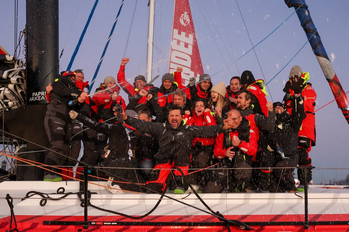 LES SABLES D'OLONNE, FRANCE - JANUARY 15, 2025 : PAPREC ARKÉA skipper Yoann Richomme (FRA) is photographed celebrating with his team after taking 2nd place in the Vendee Globe, on January 15, 2025 in Les Sables d'Olonne, France - (Photo by Jean-Marie Liot / Alea)