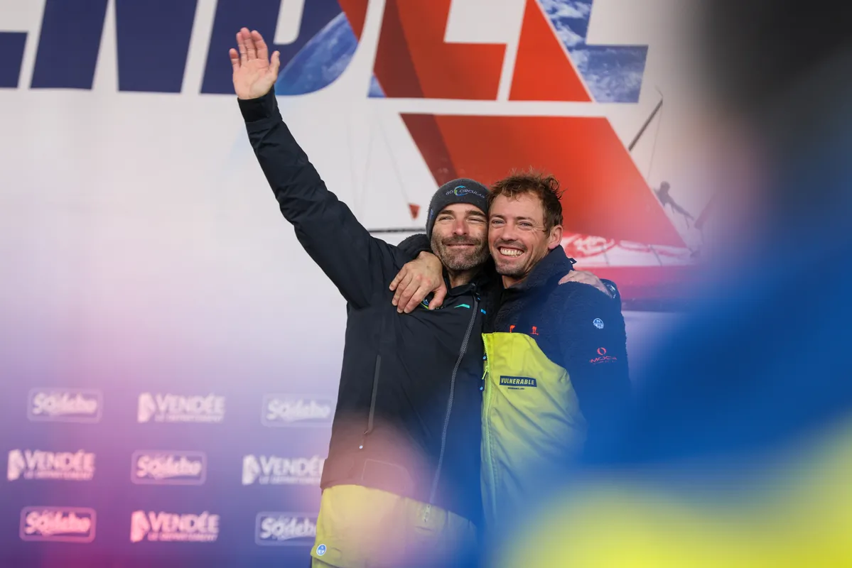 LES SABLES D'OLONNE, FRANCE - JANUARY 25, 2025 : HOLCIM - PRB skipper Nicolas Lunven (FRA) and VULNERABLE skipper Thomas Ruyant (FRA) are photographed on the stage of the Vendee Globe, on January 25, 2025 in Les Sables d'Olonne, France - (Photo by LloydImages / Alea)