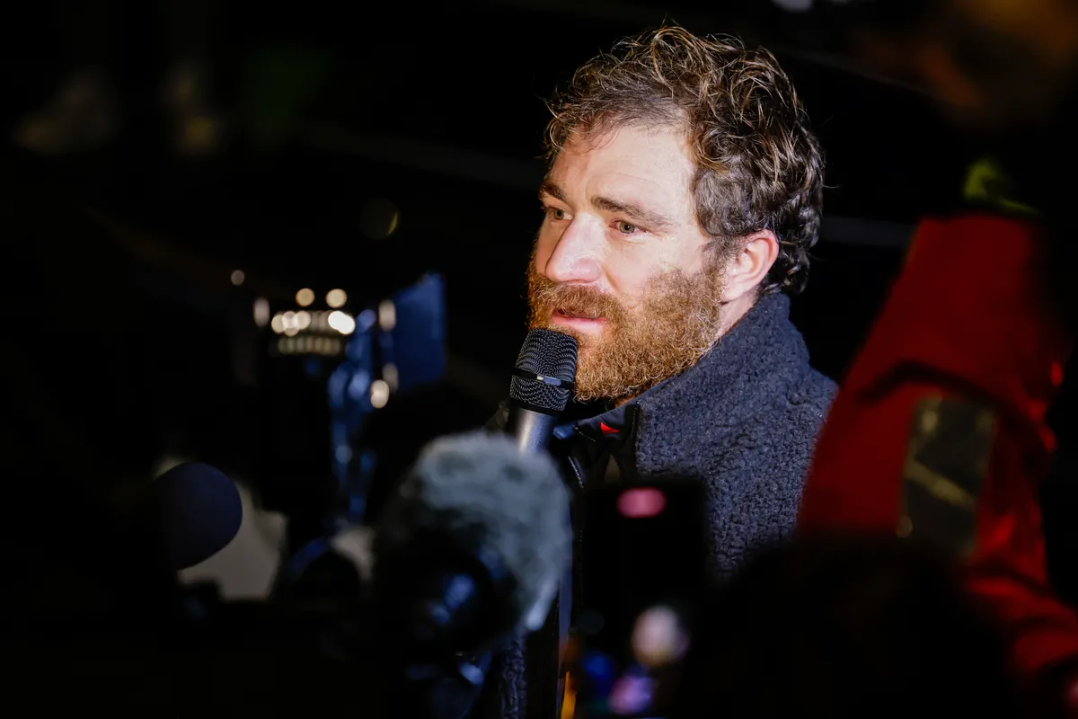 LES SABLES D'OLONNE, FRANCE - JANUARY 27, 2025 : GUYOT Environnement - Water Family skipper Benjamin Dutreux (FRA)) is being interviewed by media after taking 10th place in the Vendee Globe, on January 27, 2025 in La Rochelle, France - (Photo by Anne Beauge / Alea)