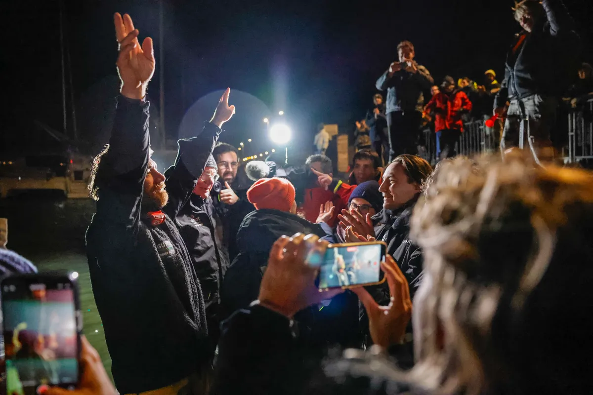 LES SABLES D'OLONNE, FRANCE - JANUARY 27, 2025 : GUYOT Environnement - Water Family skipper Benjamin Dutreux (FRA)) is celebrating after taking 10th place in the Vendee Globe, on January 27, 2025 in La Rochelle, France - (Photo by Anne Beauge / Alea)
