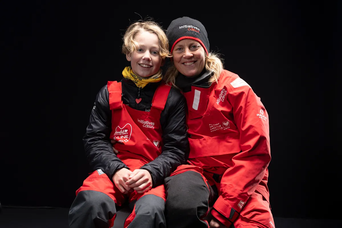 LES SABLES D'OLONNE, FRANCE - JANUARY 30, 2025 : Initiatives-Coeur skipper Sam Davies (GBR) is photographed in studio with her son Ruben after taking 13th place in the Vendee Globe, on January 30, 2025 in Les Sables d'Olonne, France - (Photo by Lloyd Images / Alea)