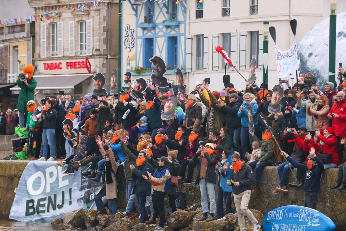 LES SABLES D'OLONNE, FRANCE - JANUARY 31, 2025 : GUYOT Environnement - Water Family skipper Benjamin Dutreux (FRA) fans are celebrating in the channel after he takes 10th place in the Vendee Globe, on January 31, 2025 in Les Sables d'Olonne, France - (Photo by Lloyd Images / Alea)