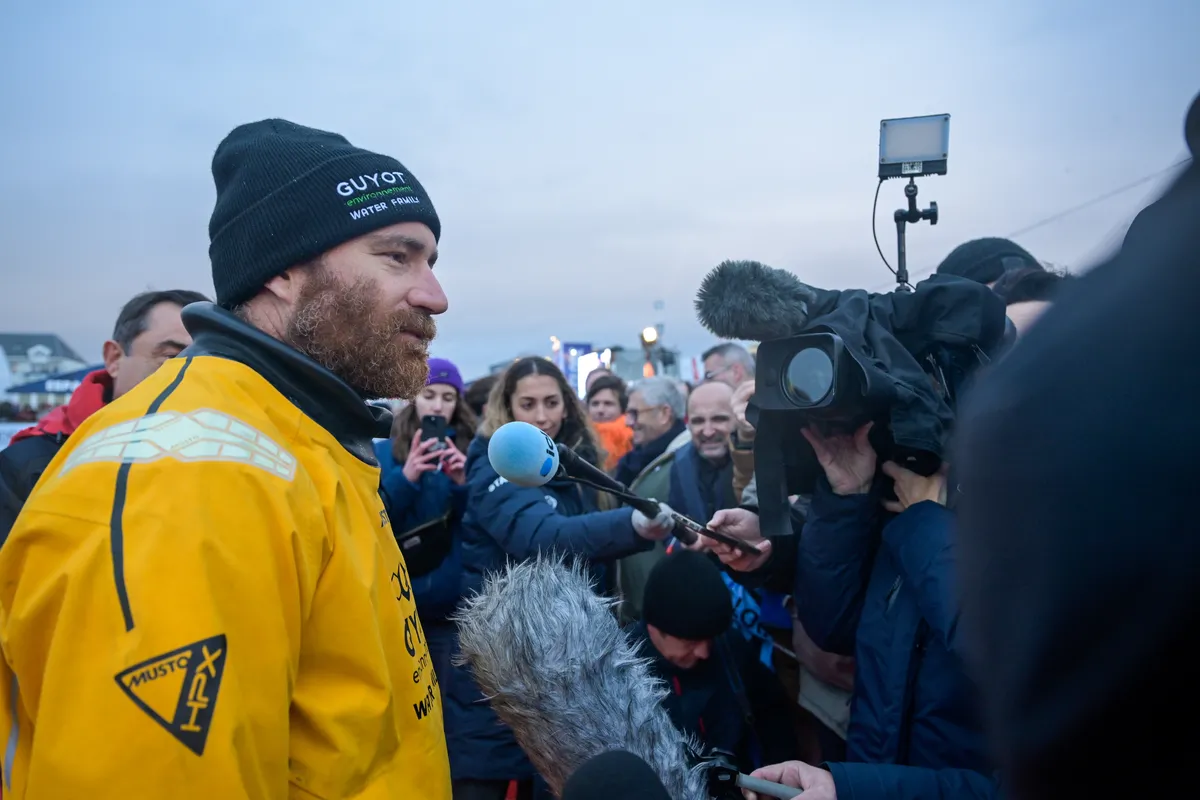 LES SABLES D'OLONNE, FRANCE - JANUARY 31, 2025 : GUYOT Environnement - Water Family skipper Benjamin Dutreux (FRA)) is celebrating at pontoon after taking 10th place in the Vendee Globe, on January 31, 2025 in Les Sables d'Olonne, France - (Photo by Olivier Blanchet / Alea)