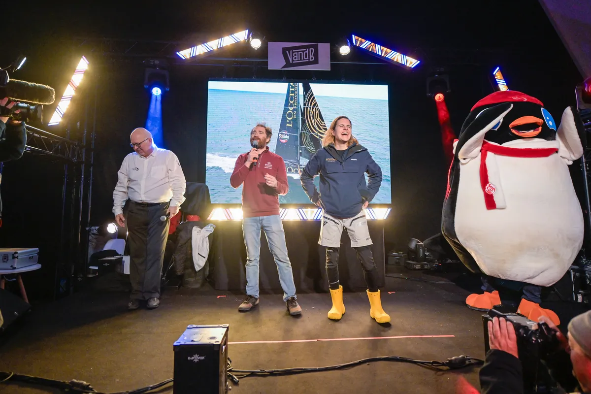 LES SABLES D'OLONNE, FRANCE - FEBRUARY 01, 2025 : GUYOT Environnement - Water Family skipper Benjamin Dutreux (FRA) and L’Occitane en Provence skipper Clarisse Crémer (FRA) are photographed at the Skipper Finisher Club of the Vendee Globe, on February 01, 2025 in Les Sables d'Olonne, France - (Photo by Olivier Blanchet / Alea)