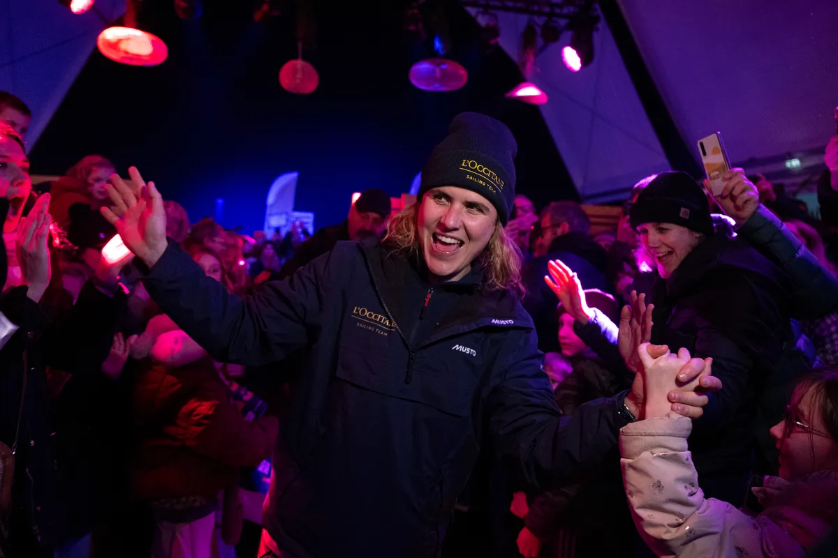 LES SABLES D'OLONNE, FRANCE - FEBRUARY 01, 2025 : GUYOT Environnement - Water Family skipper Benjamin Dutreux (FRA) and L’Occitane en Provence skipper Clarisse Crémer (FRA) are photographed at the Skipper Finisher Club of the Vendee Globe, on February 01, 2025 in Les Sables d'Olonne, France - (Photo by Olivier Blanchet / Alea)