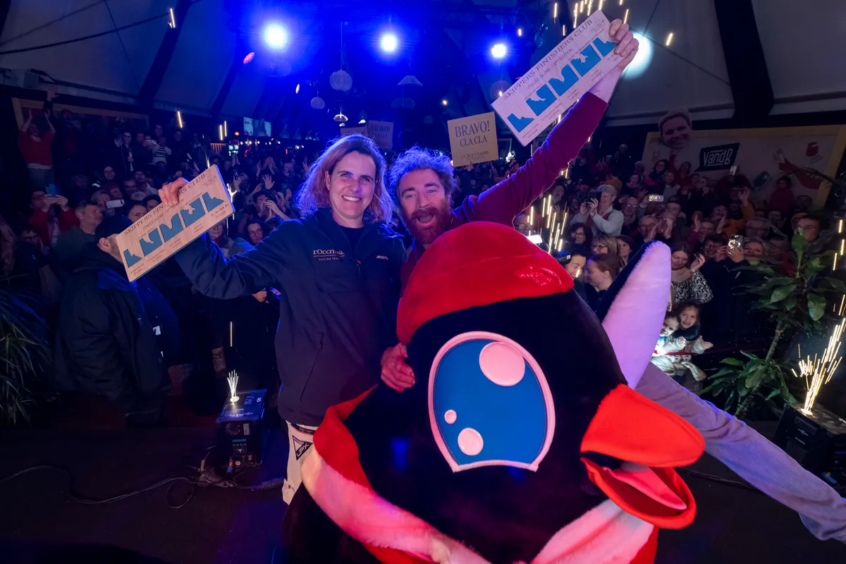 LES SABLES D'OLONNE, FRANCE - FEBRUARY 01, 2025 : GUYOT Environnement - Water Family skipper Benjamin Dutreux (FRA) and L’Occitane en Provence skipper Clarisse Crémer (FRA) are photographed at the Skipper Finisher Club of the Vendee Globe, on February 01, 2025 in Les Sables d'Olonne, France - (Photo by Olivier Blanchet / Alea)