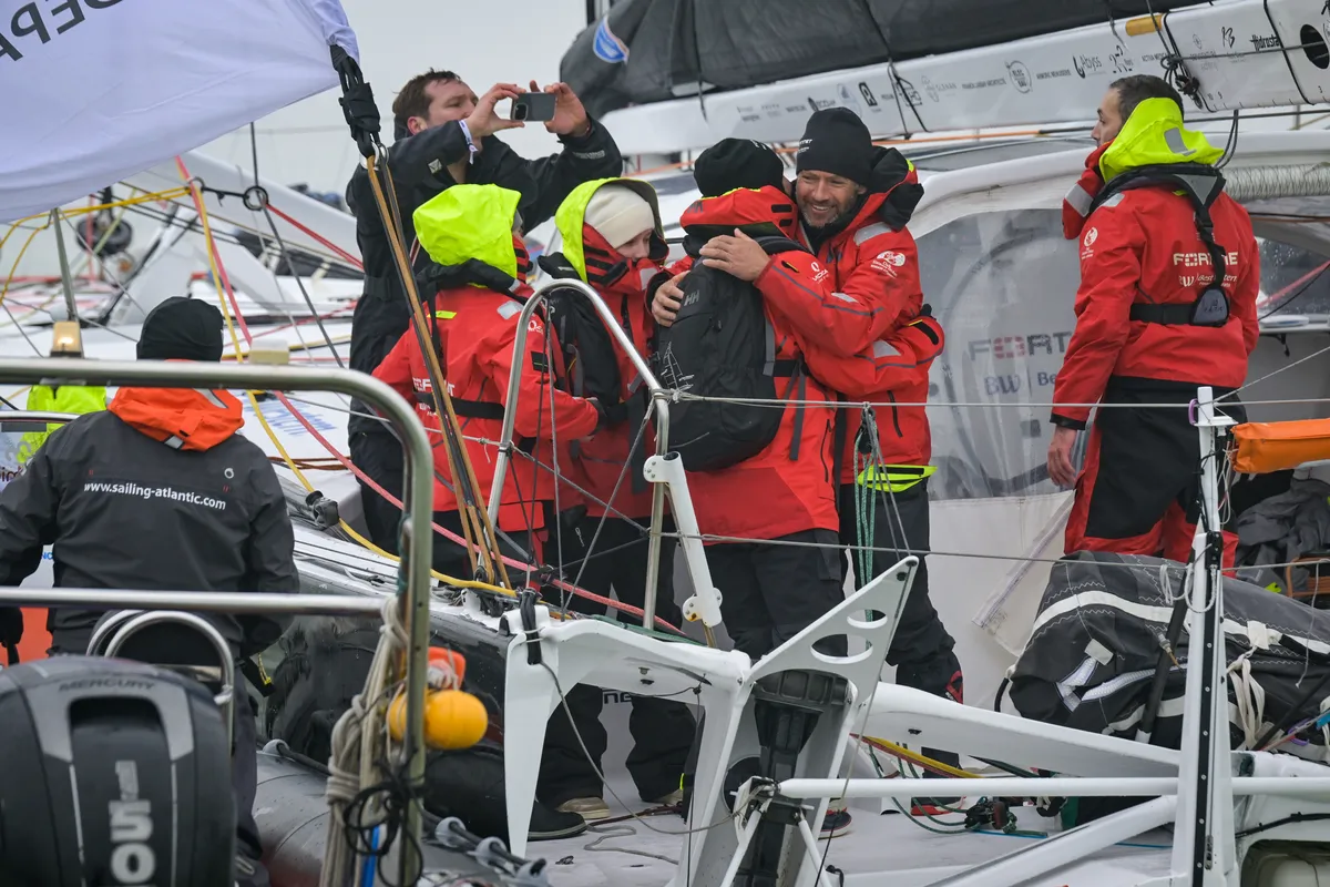 LES SABLES D'OLONNE, FRANCE - 02 FEVRIER 2025 : Le skipper de Fortinet - Best Western Romain Attanasio (FRA) fête avec son fils Ruben et son équipe sa 14ème place dans le Vendée Globe, le 02 février 2025 aux Sables d'Olonne, France - (Photo by Olivier Blanchet / Alea)