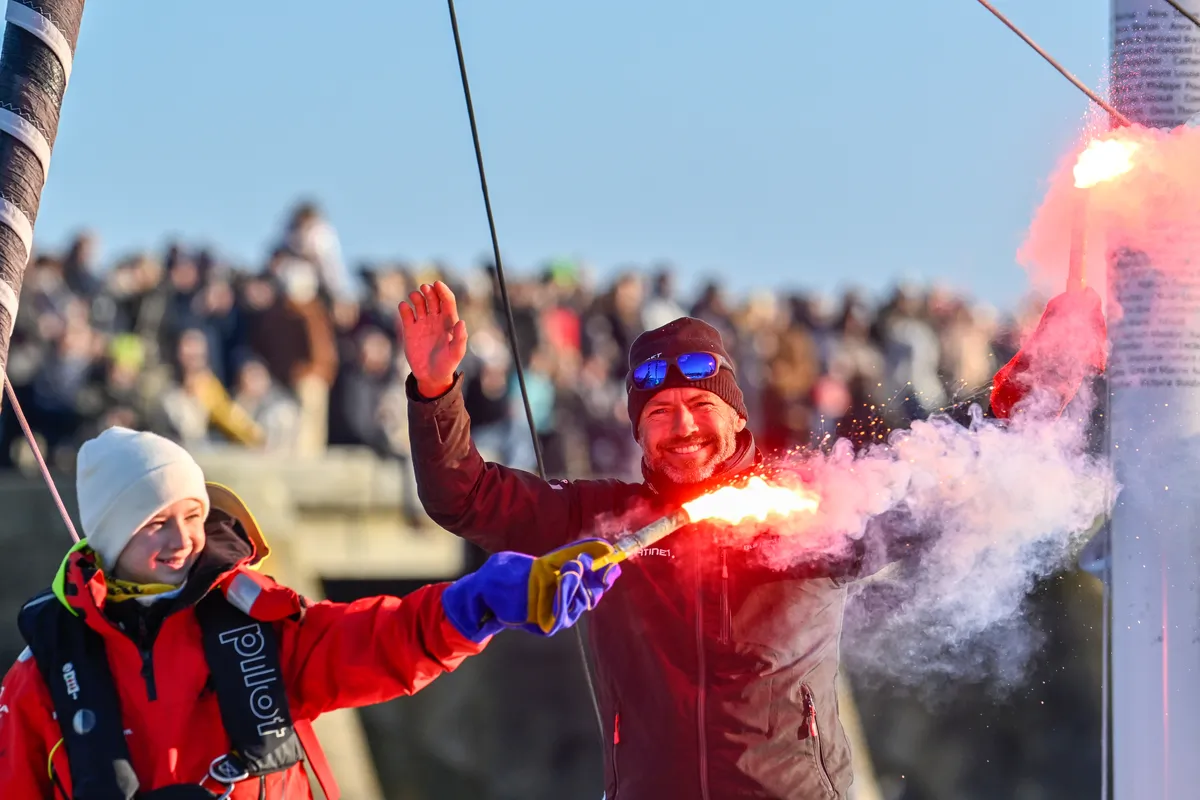 LES SABLES D’OLONNE, FRANCE - FEBRUARY 02, 2025 : Fortinet - Best Western skipper Romain Attanasio (FRA) is celebrating after taking 14th place in the Vendee Globe, on February 02, 2025 in Les Sables d'Olonne, France - (Photo by Jean-Louis Carli / Alea)