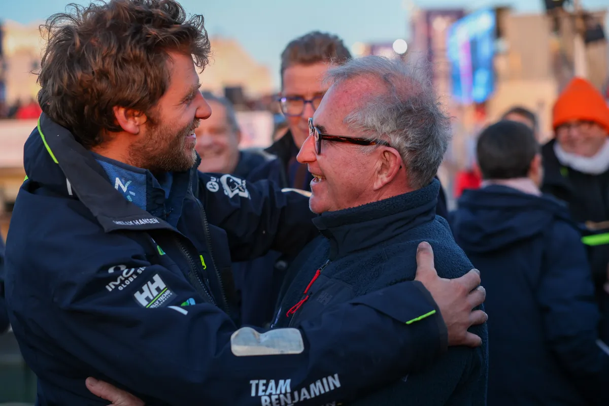 LES SABLES D’OLONNE, FRANCE - FEBRUARY 03, 2025 : Monnoyeur - DUO for a JOB skipper Benjamin Ferré (FRA) is congratulated by Jacques Caraës after taking 16th place in the Vendee Globe, on February 03, 2025 in Les Sables d'Olonne, France - (Photo by Jean-Marie Liot / Alea)