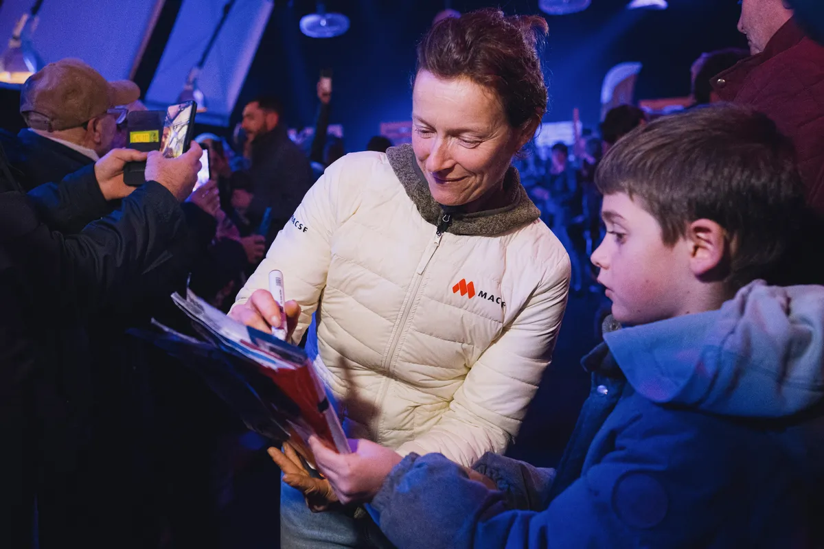 LES SABLES D'OLONNE, FRANCE - FEBRUARY 05, 2025 : MACSF skipper Isabelle Joschke (GER-FRA) is photographed signing autographs at the Skippers Finishers Club of the Vendee Globe, on February 05, 2025 in Les Sables d'Olonne, France - (Photo by Vincent Curutchet / Alea)