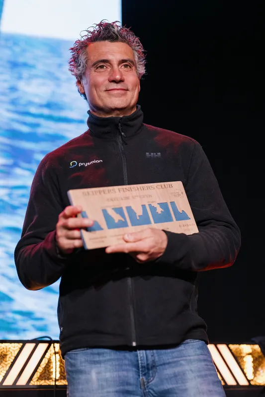 LES SABLES D'OLONNE, FRANCE - FEBRUARY 05, 2025 : Tout Commence en Finistère - Armor Lux skipper Jean le Cam (FRA), MACSF skipper Isabelle Joschke (GER-FRA), Prysmian skipper Giancarlo Pedote (ITA) and Monnoyeur - DUO for a JOB skipper Benjamin Ferré (FRA), are photographed at the Skippers Finishers Club of the Vendee Globe, on February 05, 2025 in Les Sables d'Olonne, France - (Photo by Vincent Curutchet / Alea)