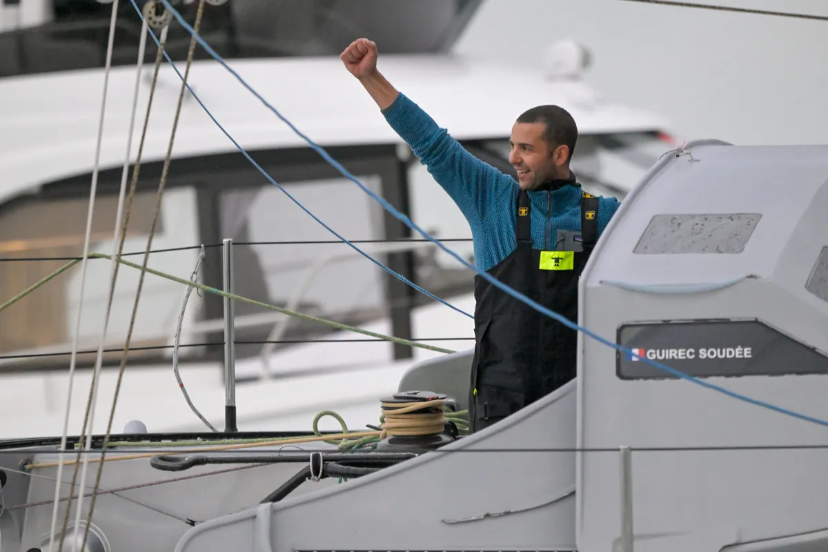 LES SABLES D’OLONNE, FRANCE - FEBRUARY 08, 2025 : Freelance.com skipper Guirec Soudée (FRA) is celebrating taking 23rd place in the Vendee Globe, on February 08, 2025 in Les Sables d'Olonne, France - (Photo by Olivier Blanchet / Alea)
