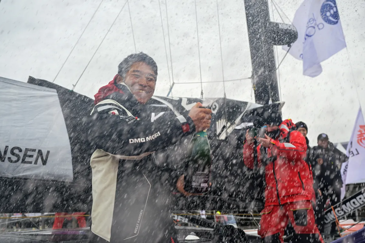 LES SABLES D'OLONNE, FRANCE - 09 FEVRIER 2025 : Le skipper de DMG MORI Global One, Kojiro Shiraishi (JAP), fête au champagne sa 24ème place dans le Vendée Globe, le 09 février 2025 aux Sables d'Olonne, France - (Photo by Olivier Blanchet / Alea)