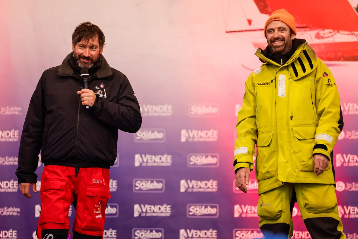 LES SABLES D'OLONNE, FRANCE - 09 FEVRIER 2025 : Louis Duc (FRA), skipper de Fives Group - Lantana Environnement, et Sébastien Marsset (FRA), skipper de FOUSSIER, sont photographiés sur scène après avoir pris les 26ème et 27ème places du Vendée Globe, le 09 février 2025 aux Sables d'Olonne, France - (Photo by Anne Beauge / Alea)
