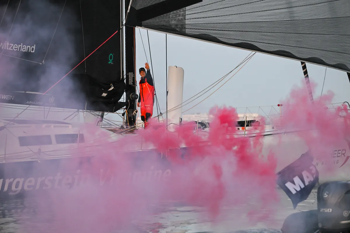 LES SABLES D’OLONNE, FRANCE - FEBRUARY 17, 2025 : Tut Gut. Sailing skipper Oliver Heer (SUI) is celebrating taking 29th place in the Vendee Globe under a very calm weather, on February 17, 2025 in Les Sables d'Olonne, France - (Photo by Vincent Curutchet / Alea)