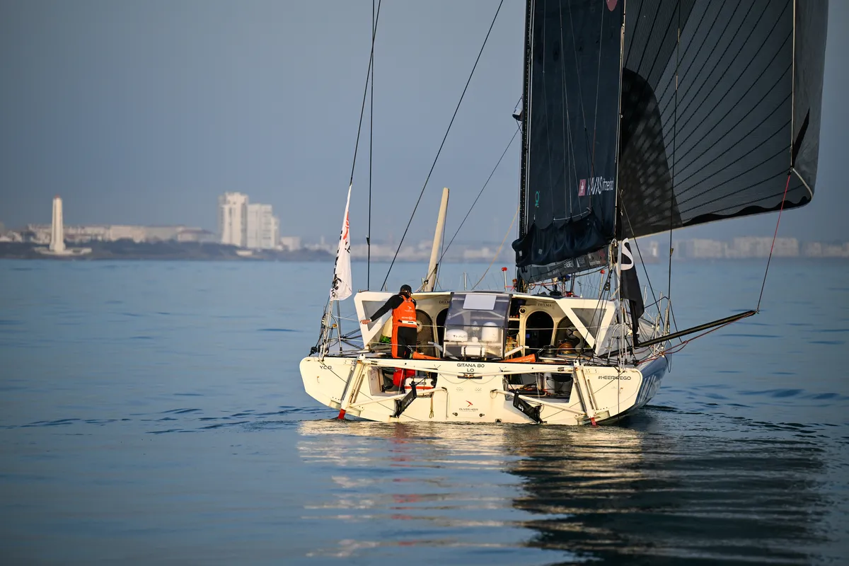 LES SABLES D’OLONNE, FRANCE - FEBRUARY 17, 2025 : Tut Gut. Sailing skipper Oliver Heer (SUI) is photographed taking 29th place in the Vendee Globe under a very calm weather, on February 17, 2025 in Les Sables d'Olonne, France - (Photo by Jean-Louis Carli / Alea)