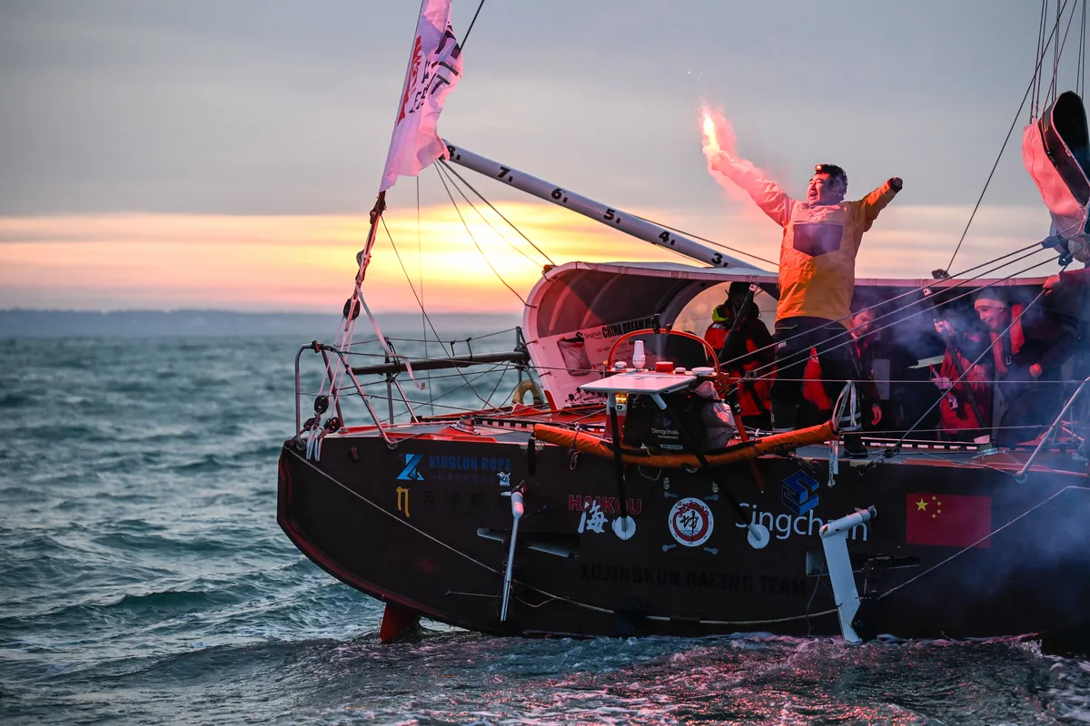 LES SABLES D'OLONNE, FRANCE - 18 FEVRIER 2025 : Le skipper de Singchain Team Haikou, Jingkun Xu (CN), fête sa 30ème place dans le Vendée Globe, le 18 février 2025 aux Sables d'Olonne, France - (Photo by Jean-Louis Carli / Alea)