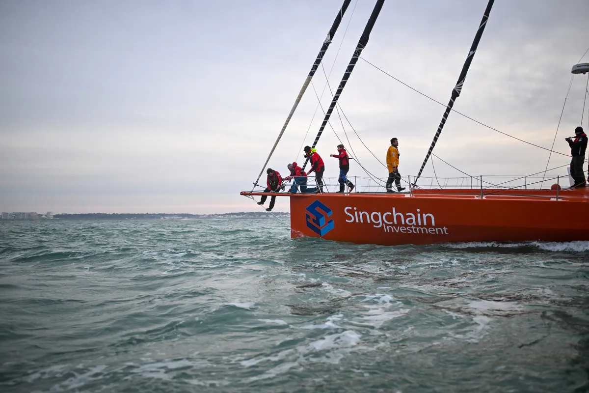 LES SABLES D'OLONNE, FRANCE - 18 FEVRIER 2025 : Le skipper de Singchain Team Haikou Jingkun Xu (CN) prend la 30ème place du Vendée Globe, le 18 février 2025 aux Sables d'Olonne, France - (Photo by Jean-Louis Carli / Alea)