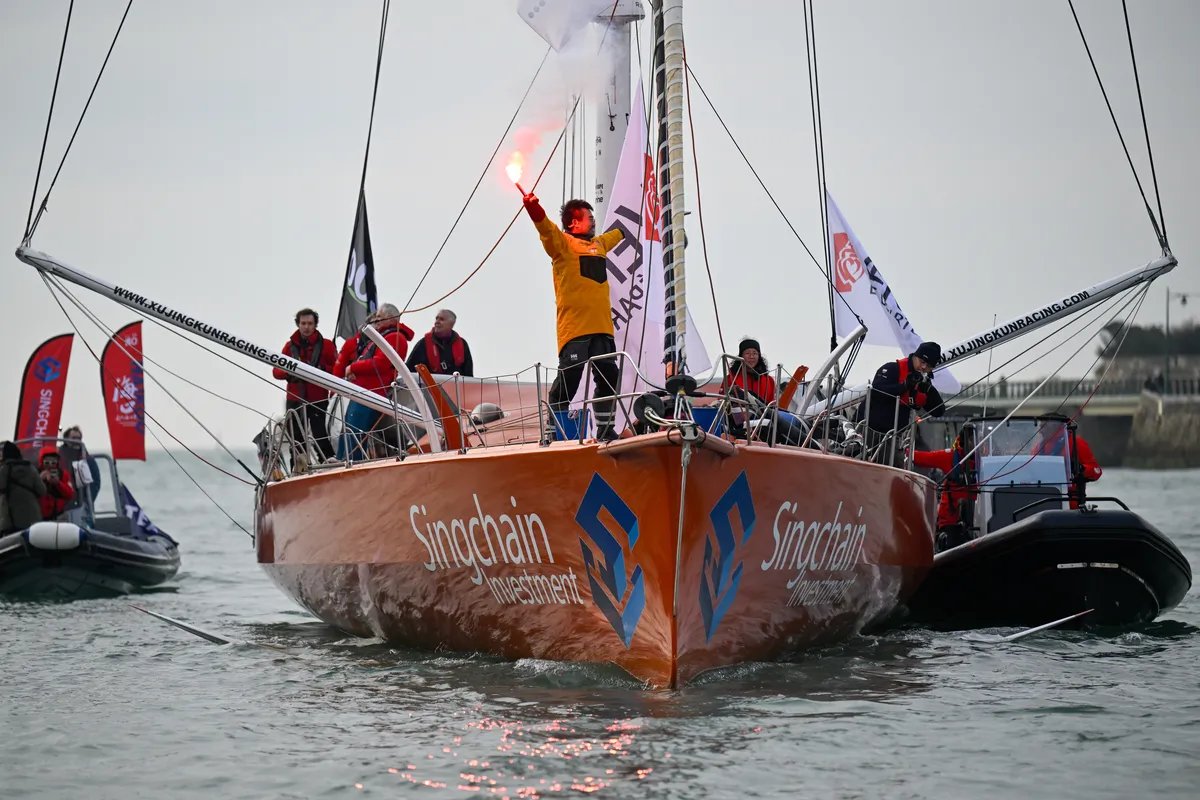 LES SABLES D’OLONNE, FRANCE - FEBRUARY 18, 2025 : Singchain Team Haikou skipper Jingkun Xu (CN) is taking 30th place in the Vendee Globe, on February 18, 2025 in Les Sables d'Olonne, France - (Photo by Jean-Louis Carli / Alea)