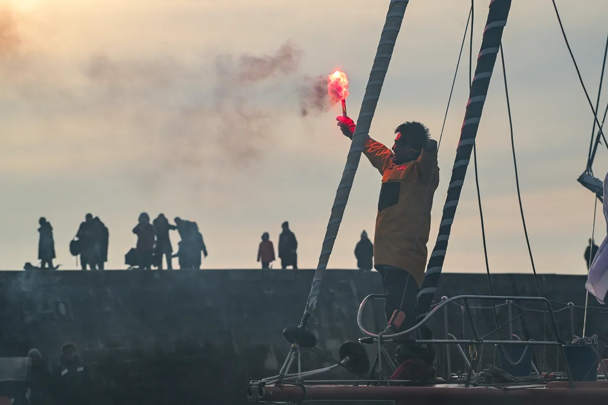 LES SABLES D’OLONNE, FRANCE - FEBRUARY 18, 2025 : Singchain Team Haikou skipper Jingkun Xu (CN) is taking 30th place in the Vendee Globe, on February 18, 2025 in Les Sables d'Olonne, France - (Photo by Vincent Curutchet / Alea)