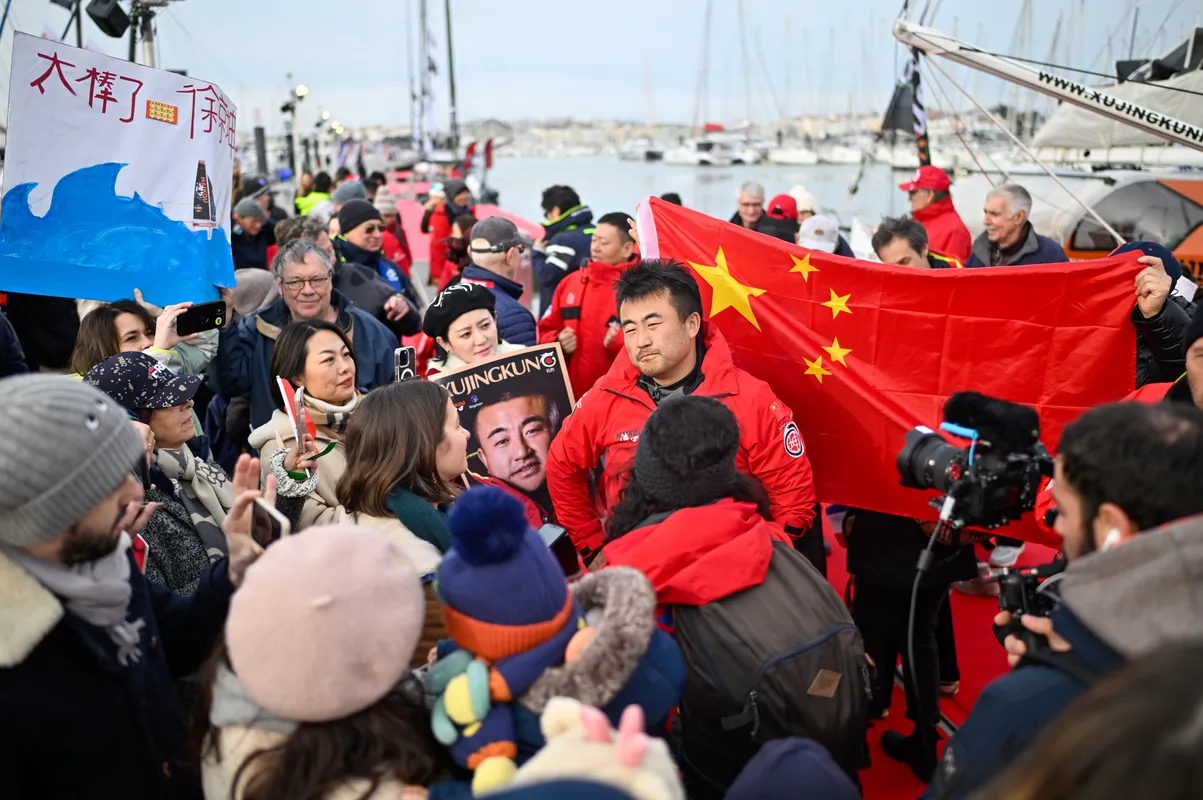 LES SABLES D’OLONNE, FRANCE - FEBRUARY 18, 2025 : Singchain Team Haikou skipper Jingkun Xu (CN) is being interviewed by media after taking 30th place in the Vendee Globe, on February 18, 2025 in Les Sables d'Olonne, France - (Photo by Jean-Louis Carli / Alea)