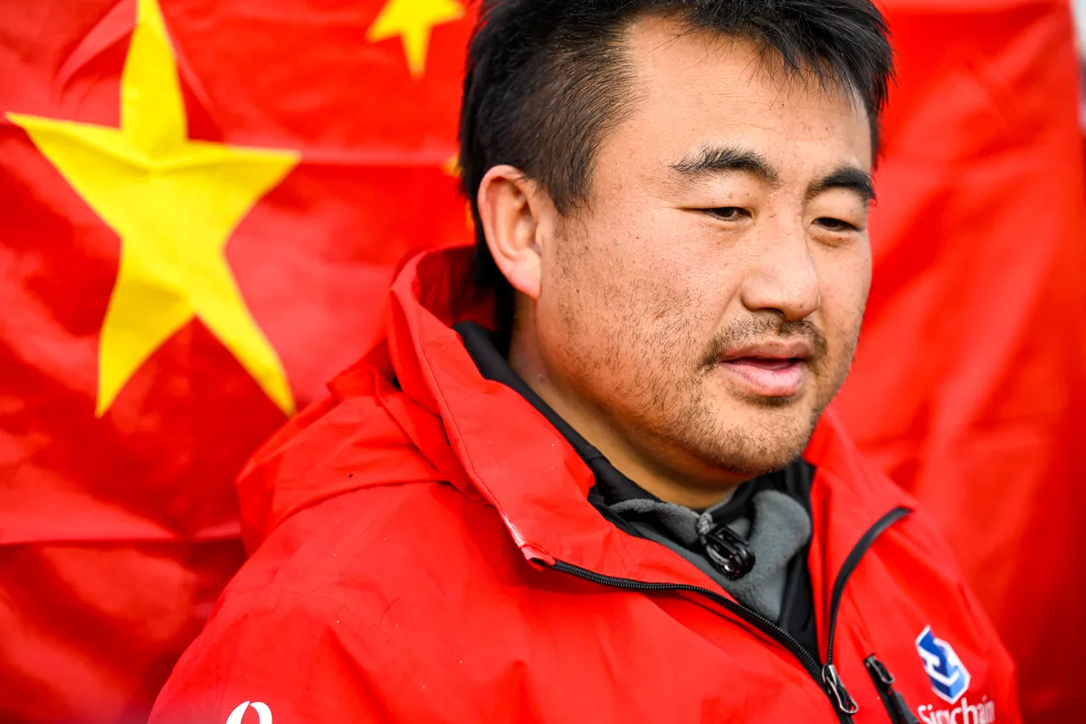 LES SABLES D’OLONNE, FRANCE - FEBRUARY 18, 2025 : Singchain Team Haikou skipper Jingkun Xu (CN) is being interviewed by media after taking 30th place in the Vendee Globe, on February 18, 2025 in Les Sables d'Olonne, France - (Photo by Jean-Louis Carli / Alea)