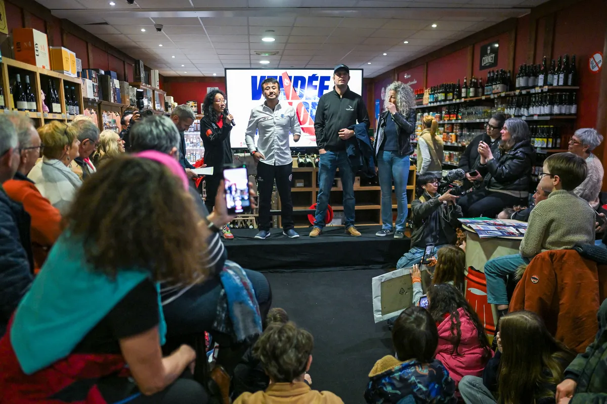LES SABLES D'OLONNE, FRANCE - FEBRUARY 18, 2025 : Tut Gut. Sailing skipper Oliver Heer (SUI) and Singchain Team Haikou skipper Jingkun Xu (CN) are photographed at the Skippers Finishers Club of the Vendee Globe, on February 18, 2025 in Les Sables d'Olonne, France - (Photo by Vincent Curutchet / Alea)