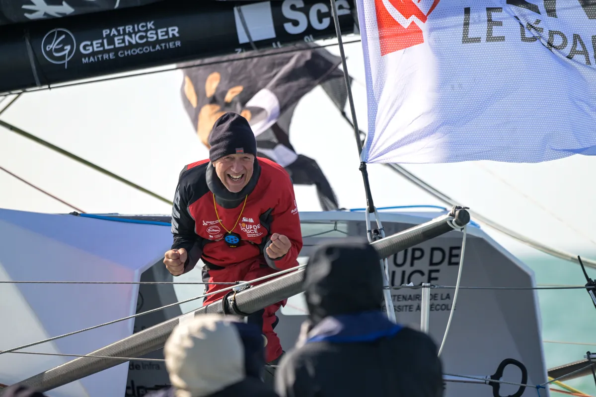 LES SABLES D’OLONNE, FRANCE - MARCH 01, 2025 : Coup de Pouce skipper Manuel Cousin (FRA) is photographe, taking 31st place in the Vendee Globe, on March 01, 2025 in Les Sables d'Olonne, France - (Photo by Olivier Blanchet / Alea)