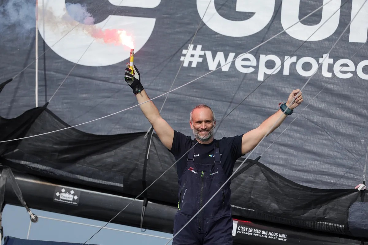 LES SABLES D’OLONNE, FRANCE - MARCH 04, 2025 : Nexans - Wewise skipper Fabrice Amedeo (FRA) is celebrating taking 32nd place in the Vendee Globe, on March 04, 2025 in Les Sables d'Olonne, France - (Photo by Jean-Marie Liot / Alea)