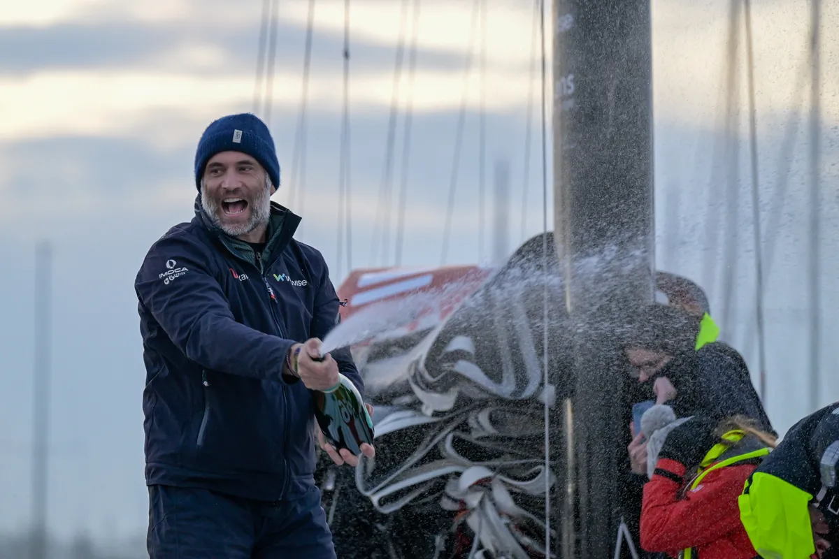 LES SABLES D'OLONNE, FRANCE - 04 MARS 2025 : Nexans - Fabrice Amedeo (FRA), skipper de Wewise, fête au champagne sa 32ème place au Vendée Globe, le 04 mars 2025 aux Sables d'Olonne, France - (Photo by Olivier Blanchet / Alea)