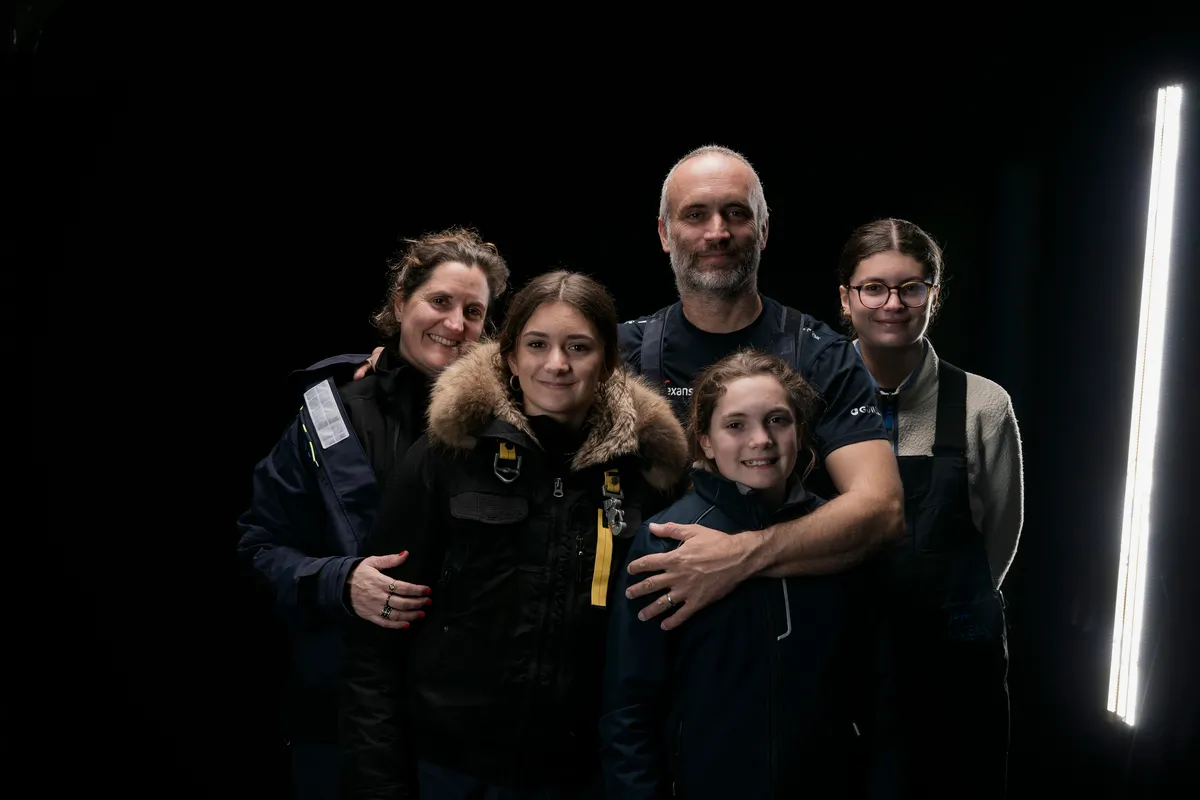 LES SABLES D'OLONNE, FRANCE - MARCH 04, 2025 : Nexans - Wewise skipper Fabrice Amedeo (FRA) is photographed in studio with his family, wife and daughters, after taking 32nd place in the Vendee Globe, on March 04, 2025 in Les Sables d'Olonne, France - (Photo by Jean-Marie Liot / Alea)